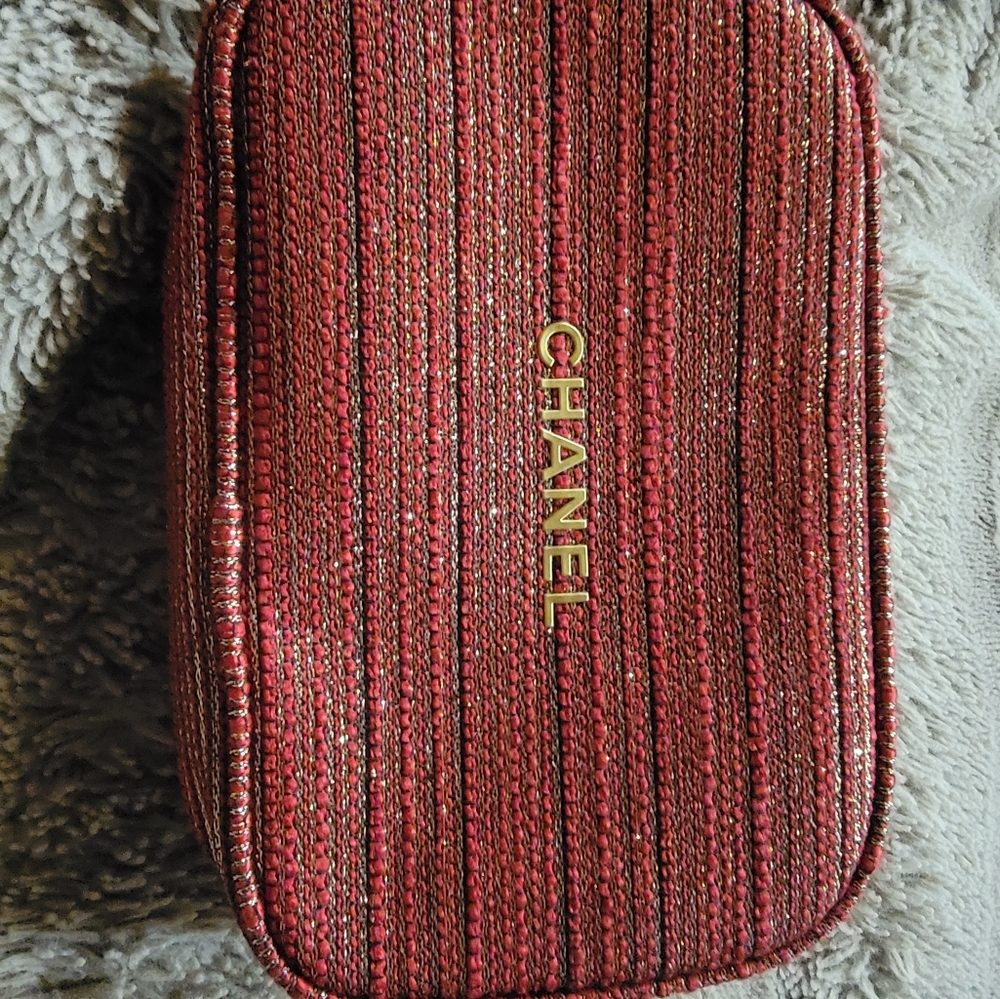 Red and Gold Chanel makeup bag.